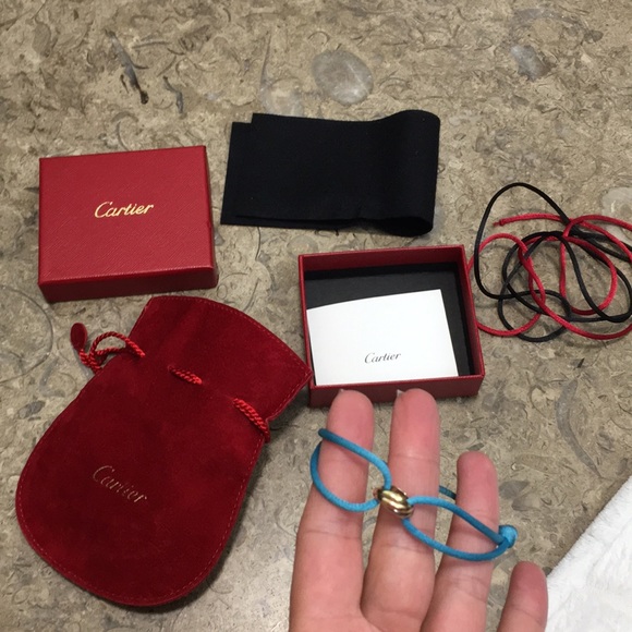 100% authentic Cartier string bracelet with trinity ring in turquoise
